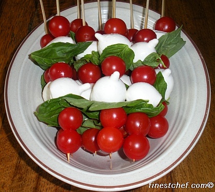 Tomato bocconcini salad skewers with fresh basil