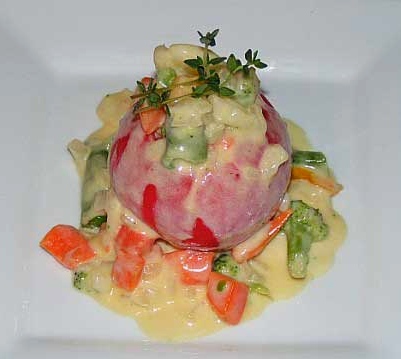 Stuffed tomato with vegetables