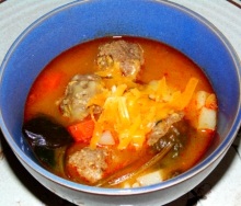 Meatball soup with spinach