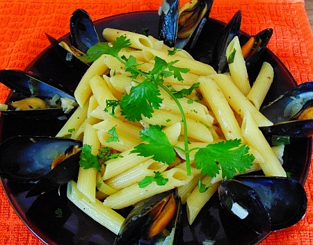Penne pasta with mussels in white wine sauce